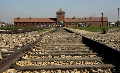 Railway tracks at the Auschwitz-Birkenau memorial in Poland, where St. Maximilian Kolbe and St. Edith Stein were martyred.