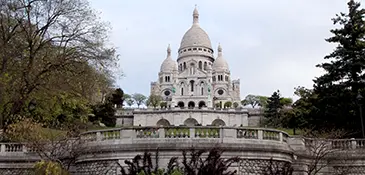 The Basilica of the Sacred Heart of Paris atop Montmartre, the white-domed Romano-Byzantine shrine of perpetual adoration, France