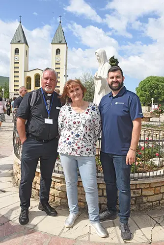 Fr. Dan Reehil, Ann Vucic  and Ivan Ostojicand 