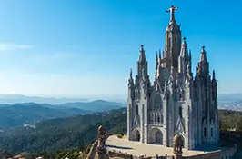 The Temple of the Sacred Heart of Jesus crowned by the bronze Christ statue atop Mount Tibidabo, Barcelona