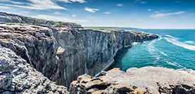 The rocky limestone heights of the Burren meeting the coast