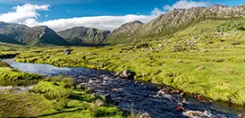 A Connemara landscape of river, bog, and mountains