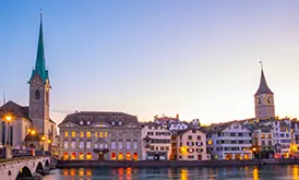 The Fraumünster church across the Limmat river and bridge in Zürich, Switzerland