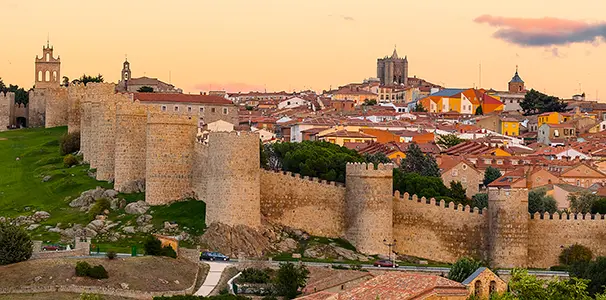 The medieval walls encircling Avila, Spain, birthplace of St. Teresa of Jesus — a stop on the Camino de Santiago Catholic pilgrimage