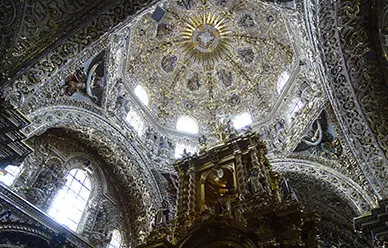 The gilded baroque interior of the Capilla del Rosario in Santo Domingo Church, Puebla, Mexico