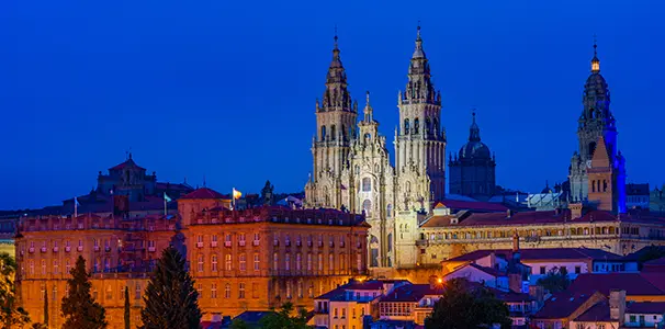 The Cathedral of Santiago de Compostela illuminated at night in the Praza do Obradoiro — journey's end on the Camino de Santiago