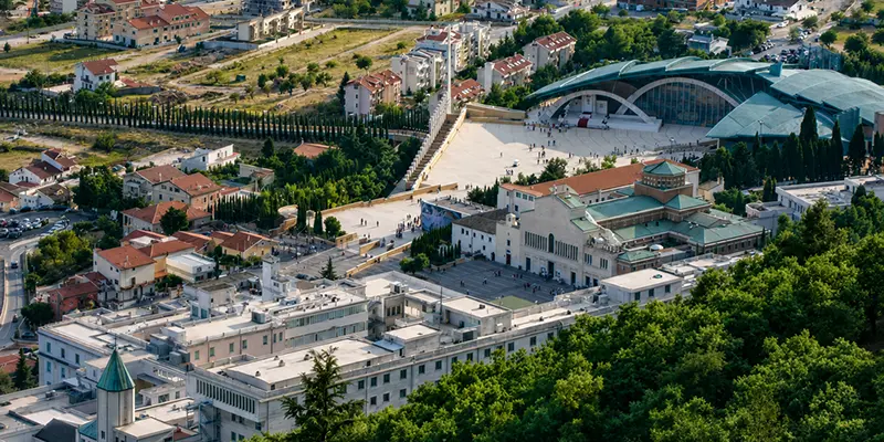 Aerial view of the shrine complex at San Giovanni Rotondo, Italy, showing the great plaza and the Church of Saint Pio.