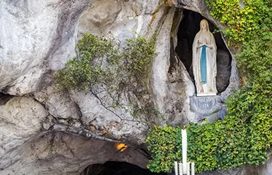 Statue of Our Lady in the Grotto of Massabielle at Lourdes — France pilgrimage