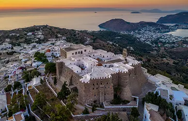 Monastery of St. John the Theologian above Skala on Patmos at sunset — Turkey and Greece pilgrimage