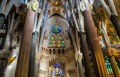 Stained glass and tree-like columns inside the Sagrada Família, Barcelona — Sacred Encounters pilgrimage